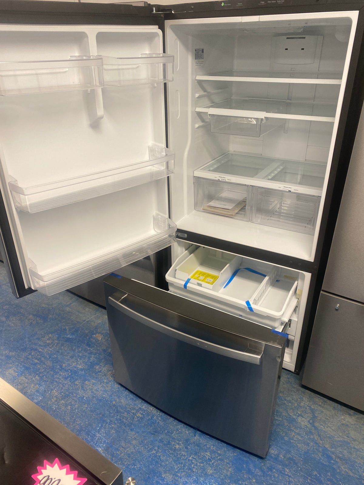 GE 33” Wide 25 cu. ft. Bottom Freezer Refrigerator