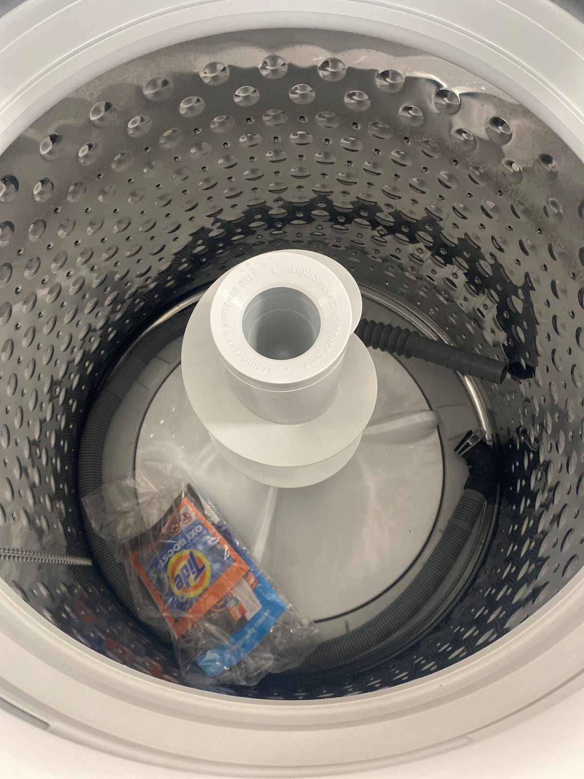 GE Top Load High-Efficiency Washer & 7.2 cu. ft. Natural Gas Dryer