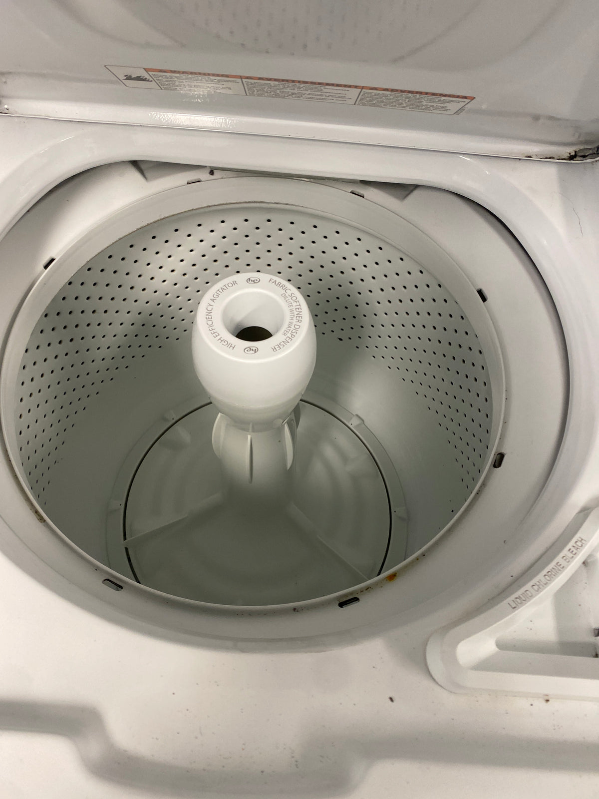 Whirlpool 27” wide Top-Load Washer & Electric Dryer Stacked Laundry Center