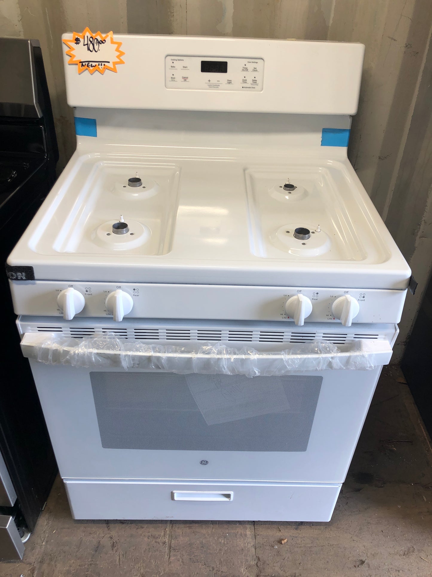 NEW!! 4 burner GE Gas Range